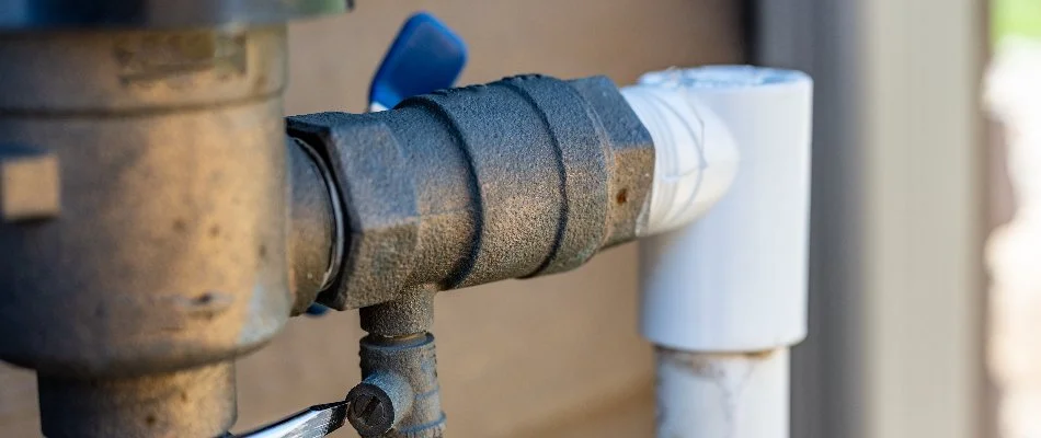 Irrigation backflow prevention device on a house in Memphis, TN.